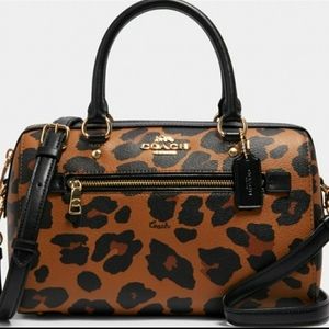 💞HP💞2 PCS New Coach Leopard Rowan and matching wallet set
